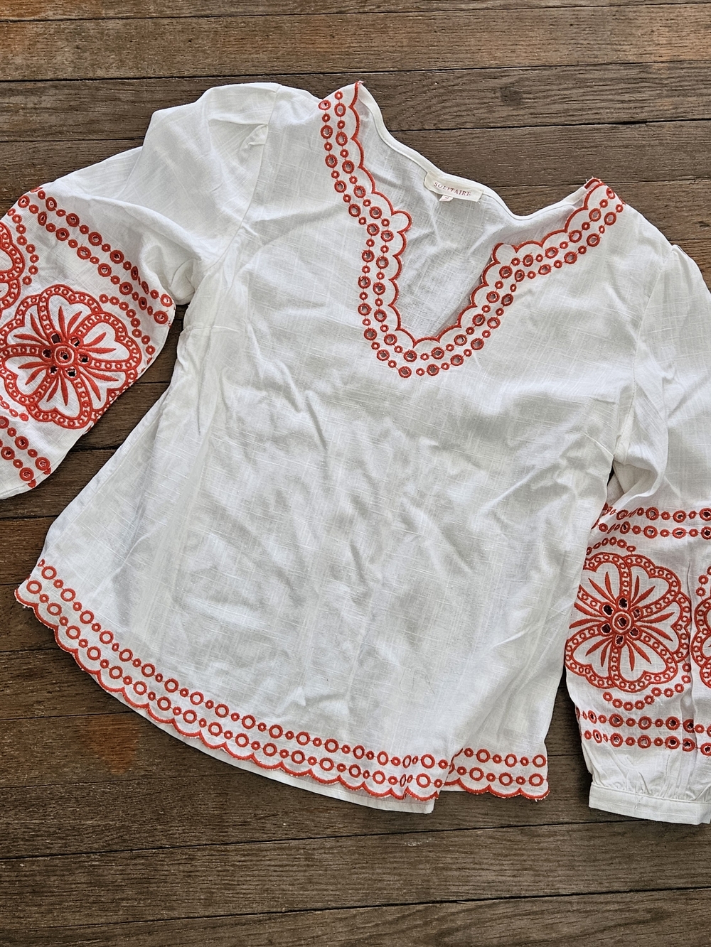 White Embroidered V-Neck Peasant Top with Reddish/Orange Accents